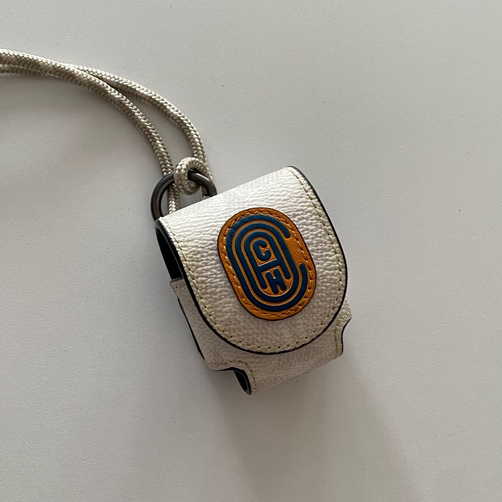 Coach First Generation EarPods case in white  monogram material and leather